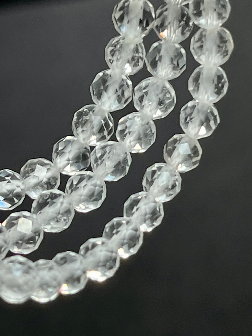 Clear Crystal Quartz faceted round 4mm bead stretch bracelet (premium)