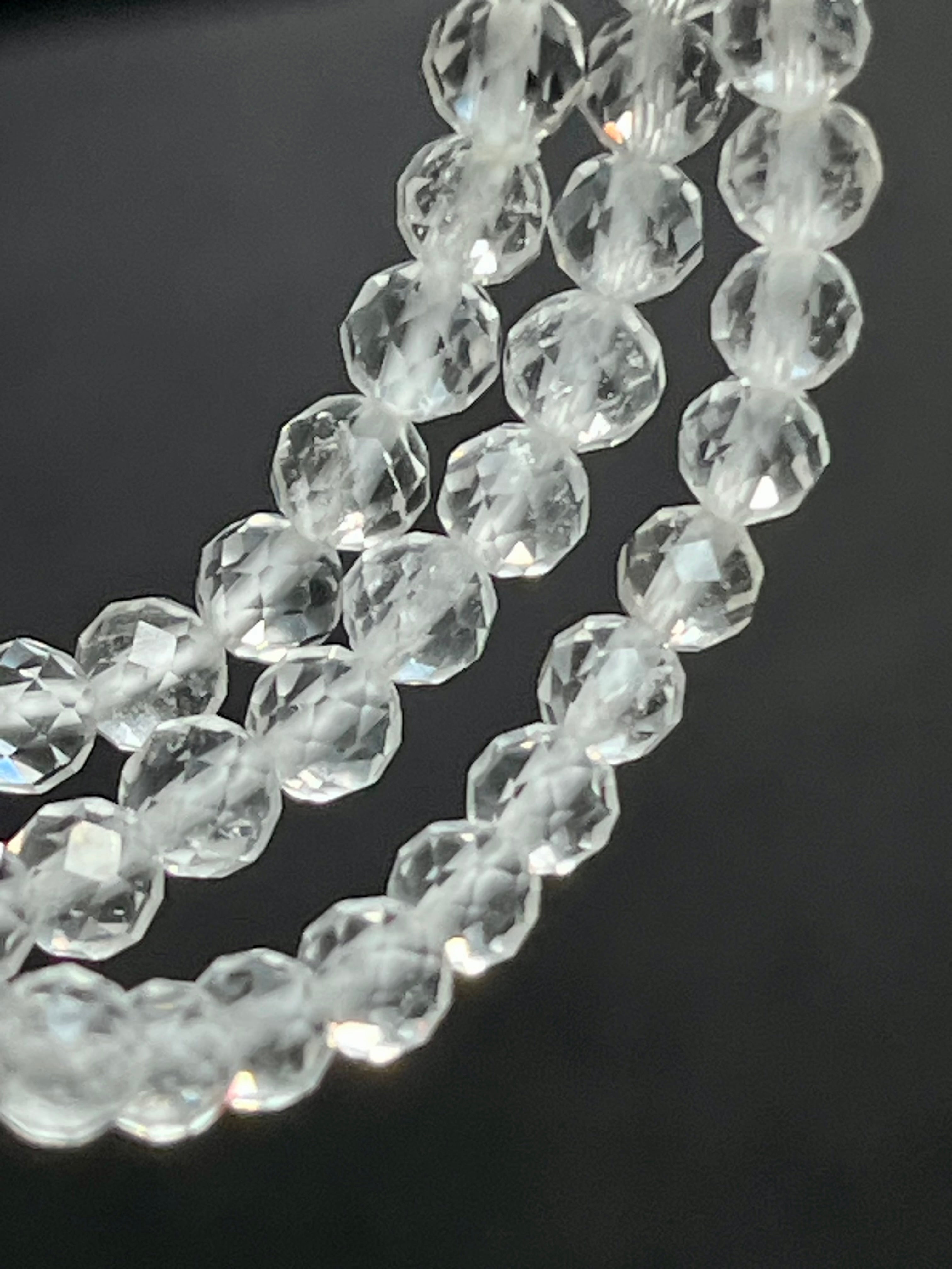 Clear Crystal Quartz faceted round 4mm bead stretch bracelet (premium)