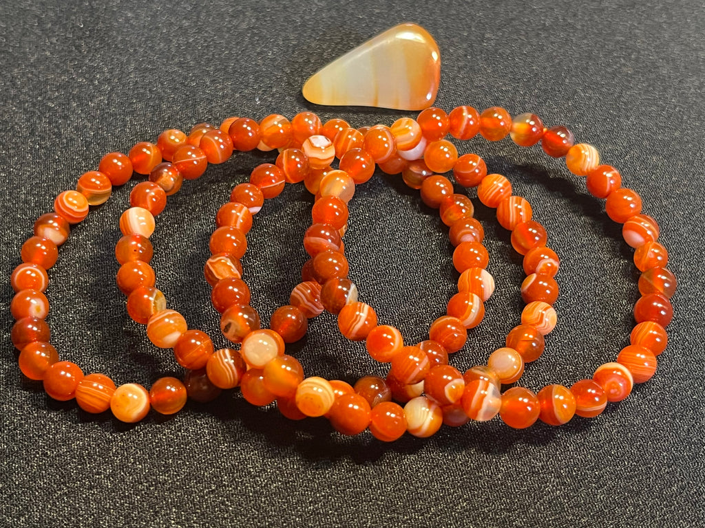 Carnelian (dark orange) smooth round 6mm bead stretch bracelet; July birthstone