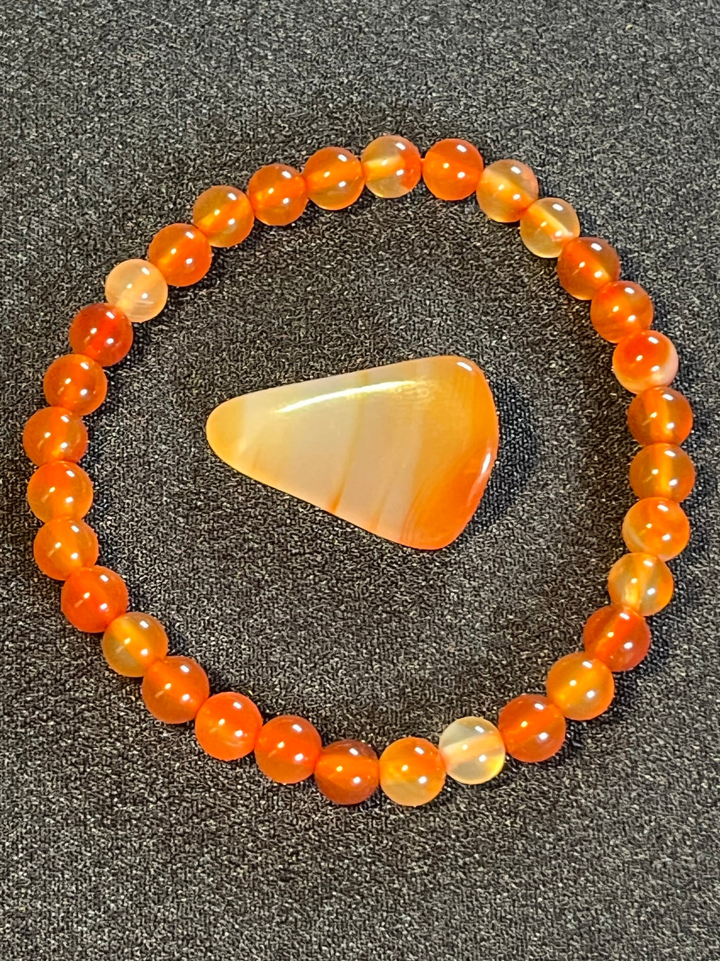 Carnelian (natural orange) smooth round 6mm bead stretch bracelet; July birthstone