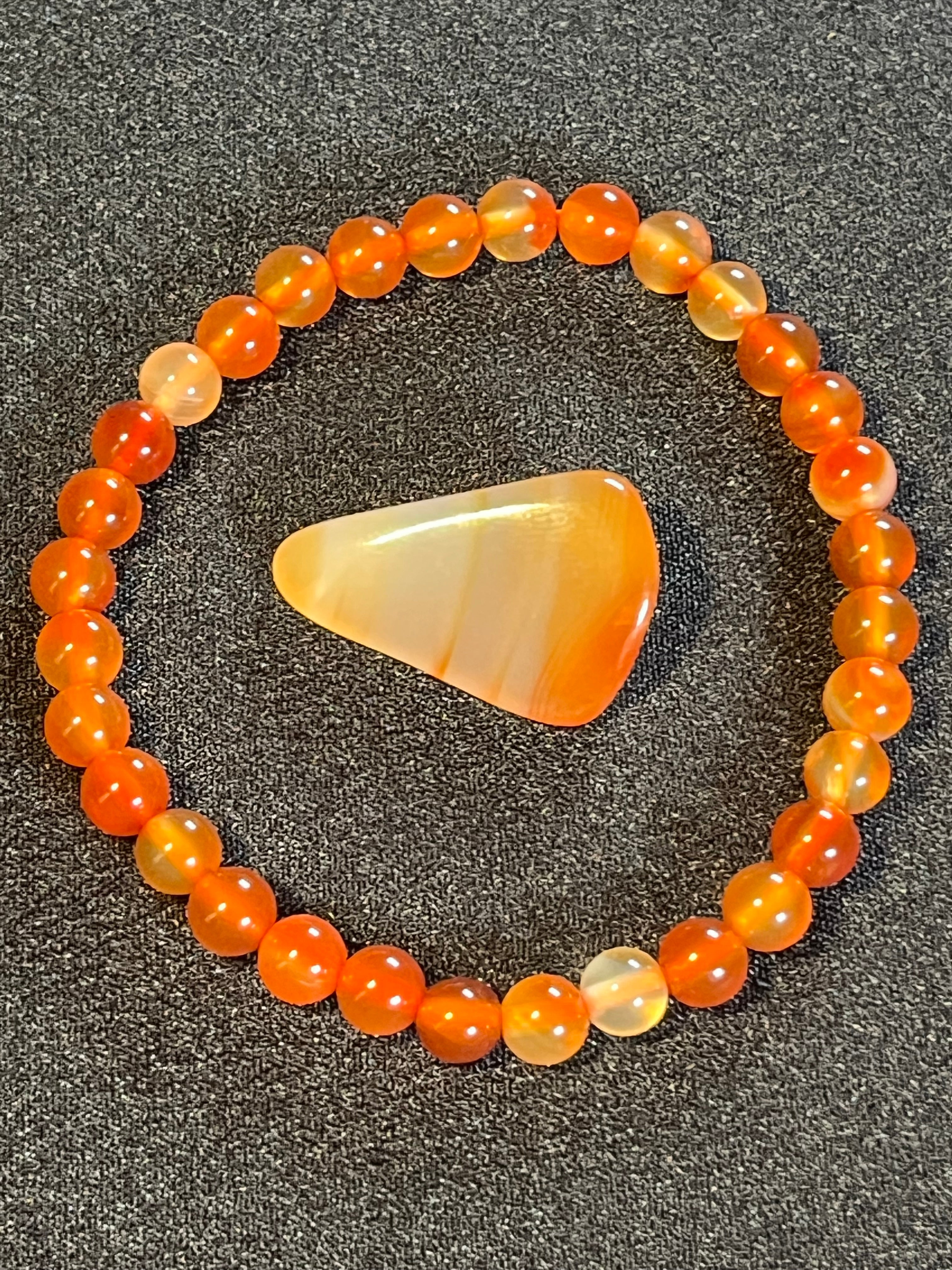 Carnelian (natural orange) smooth round 6mm bead stretch bracelet; July birthstone