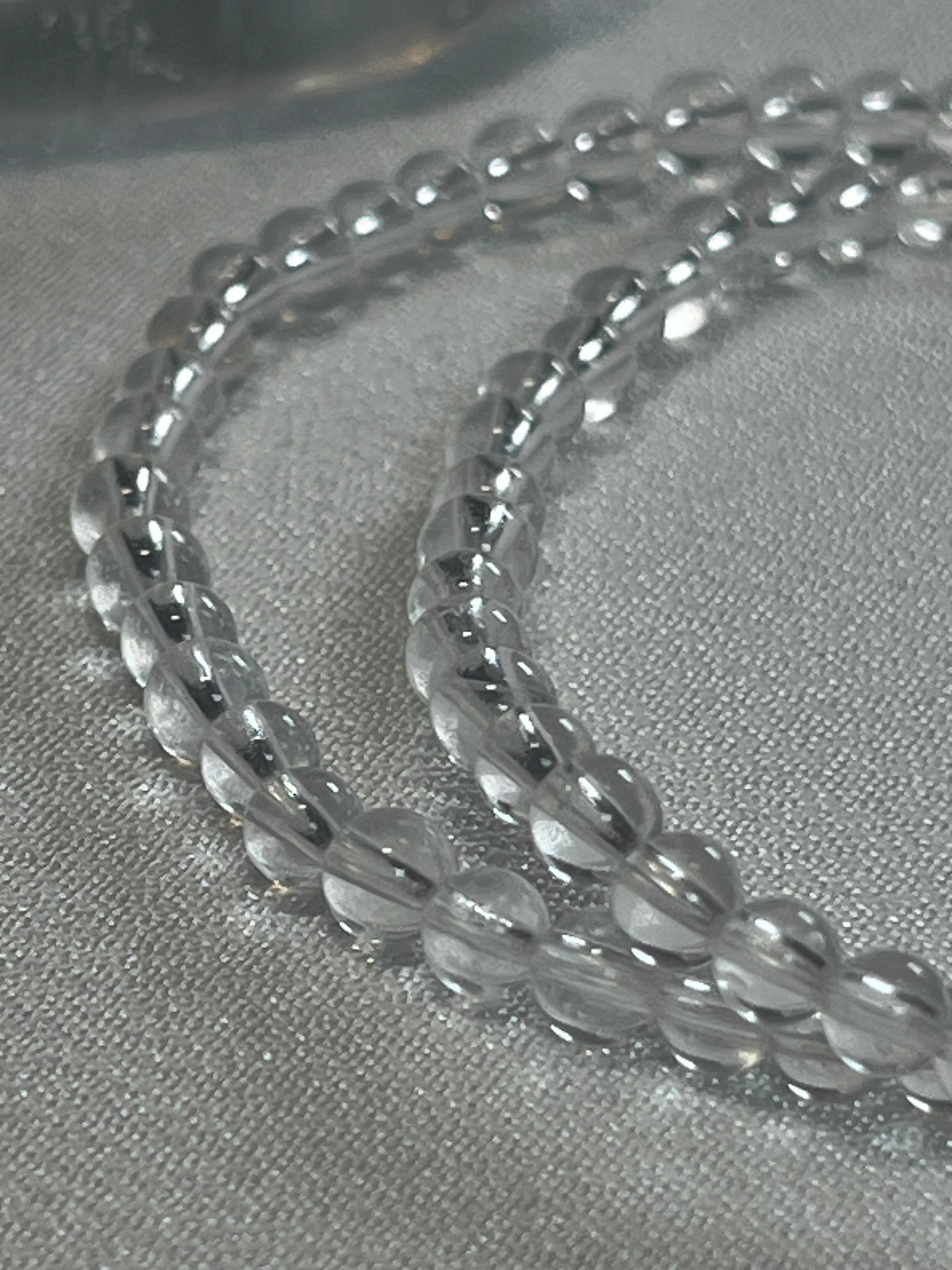 Clear Crystal Quartz smooth round 4mm, 6mm bead stretch bracelet (premium)
