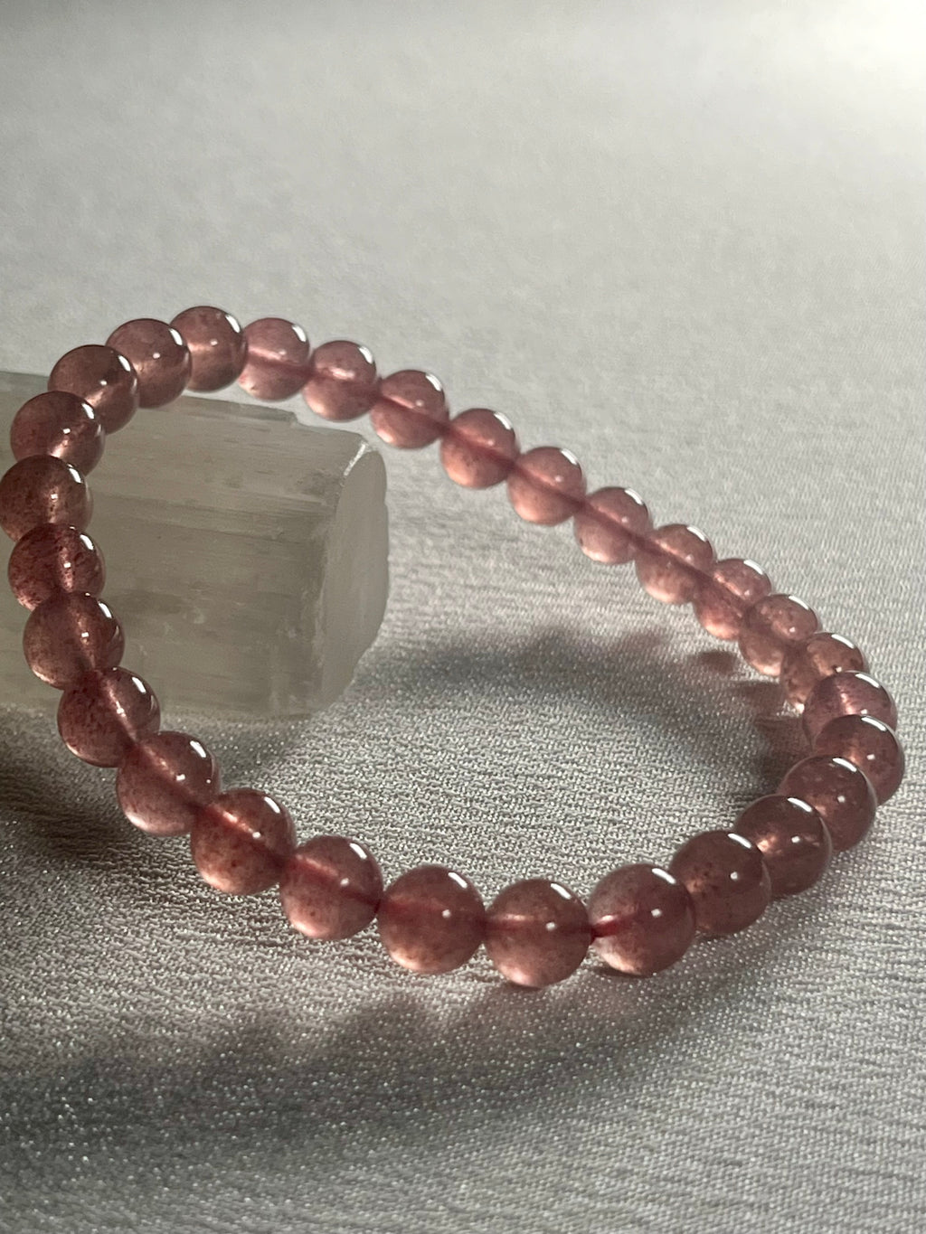 Strawberry Quartz smooth round 6mm bead stretch bracelet (AA grade)