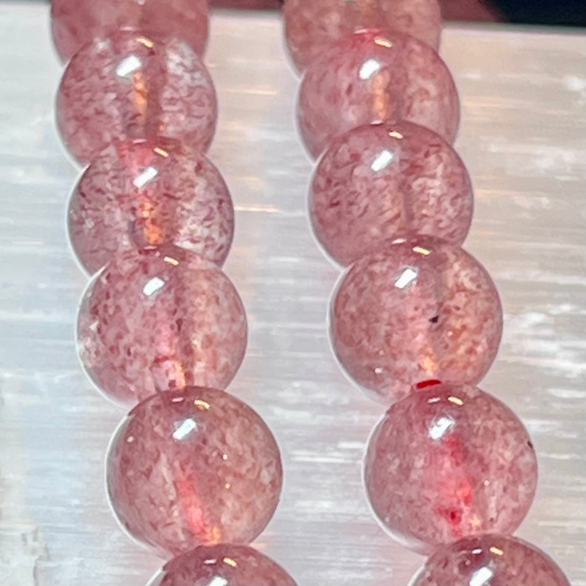 Strawberry Quartz smooth round 6mm bead stretch bracelet (AAA grade)