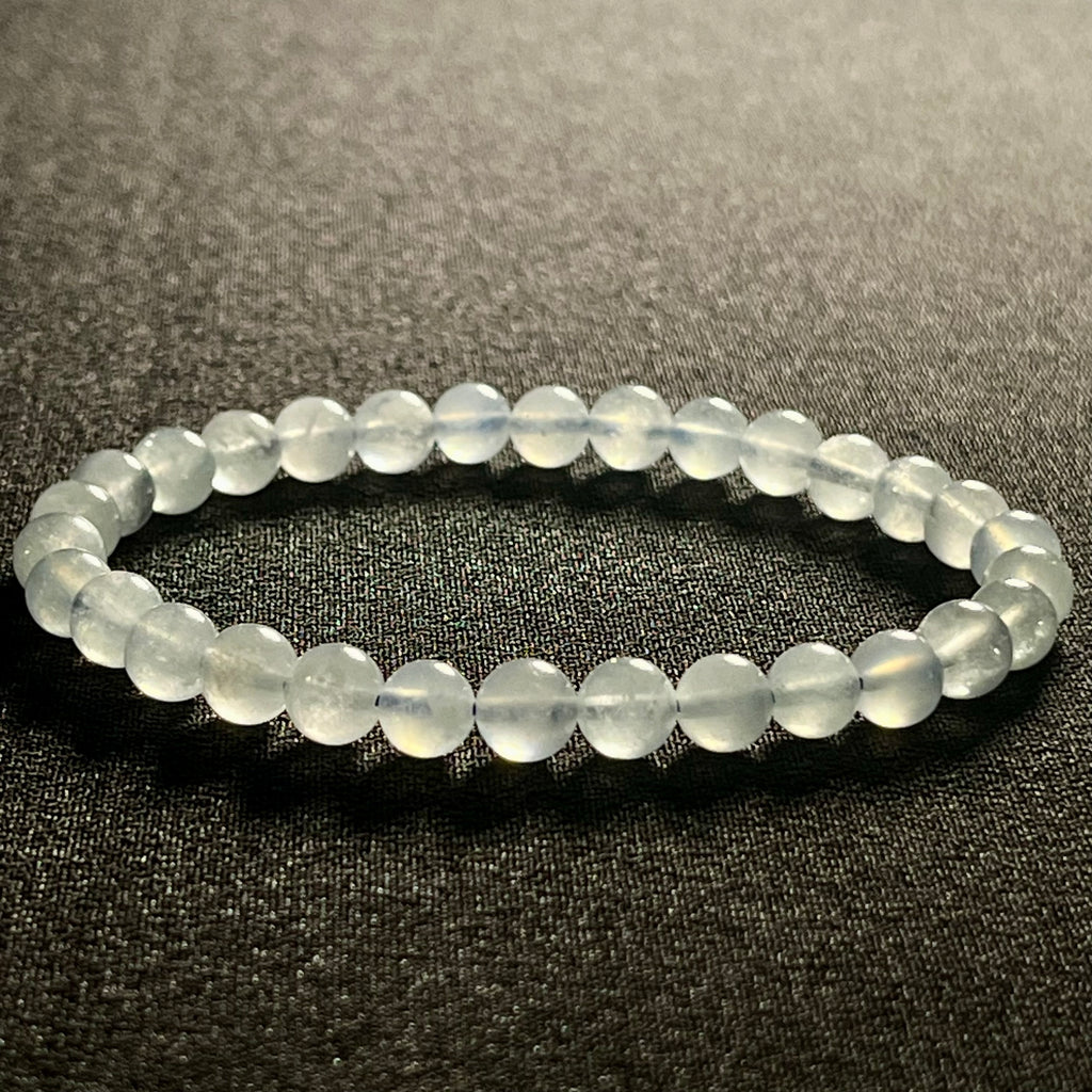 Aquamarine smooth round 6mm bead stretch bracelet; March birthstone