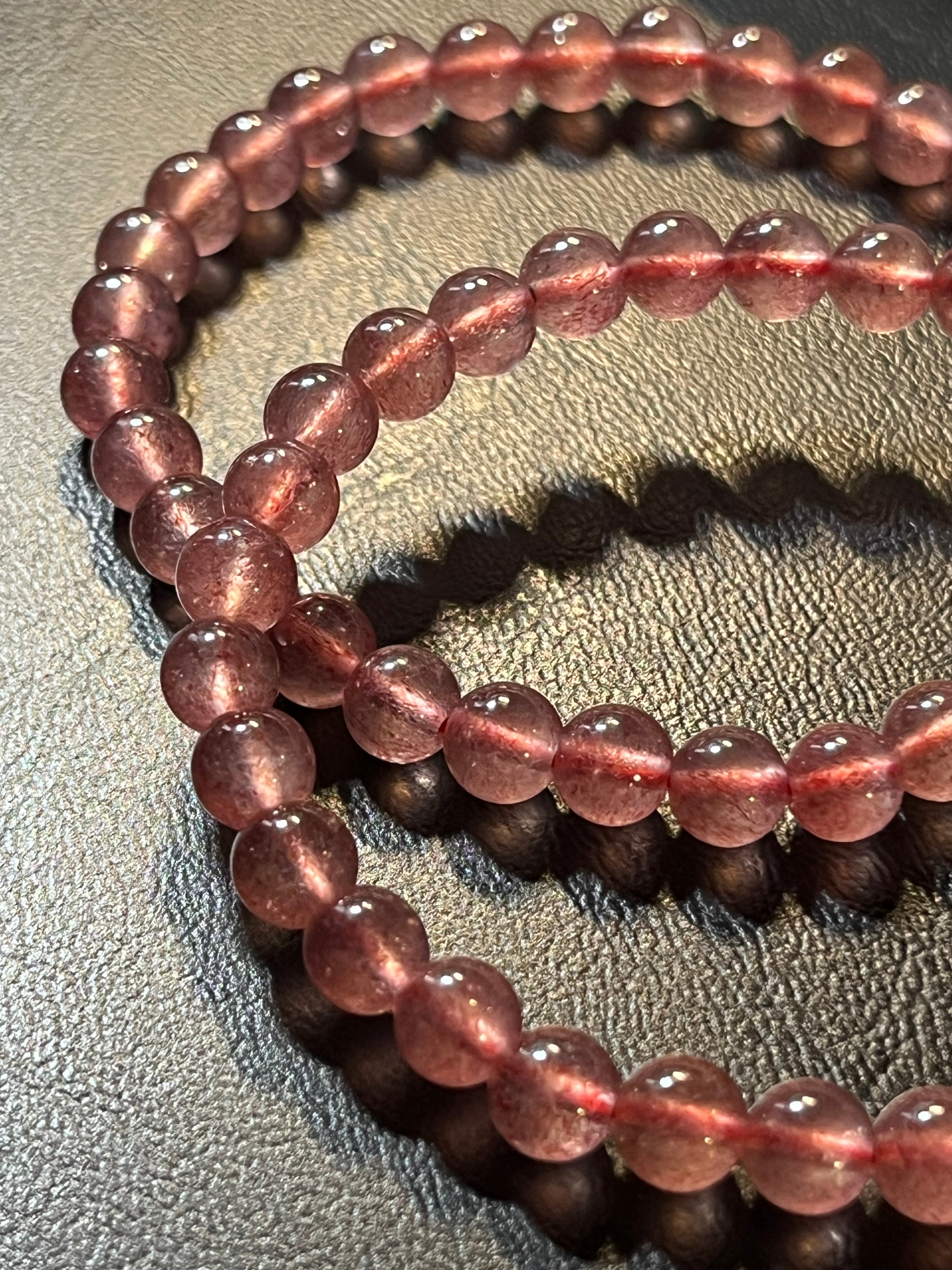 Strawberry Quartz smooth round 6mm bead stretch bracelet (AAA grade)