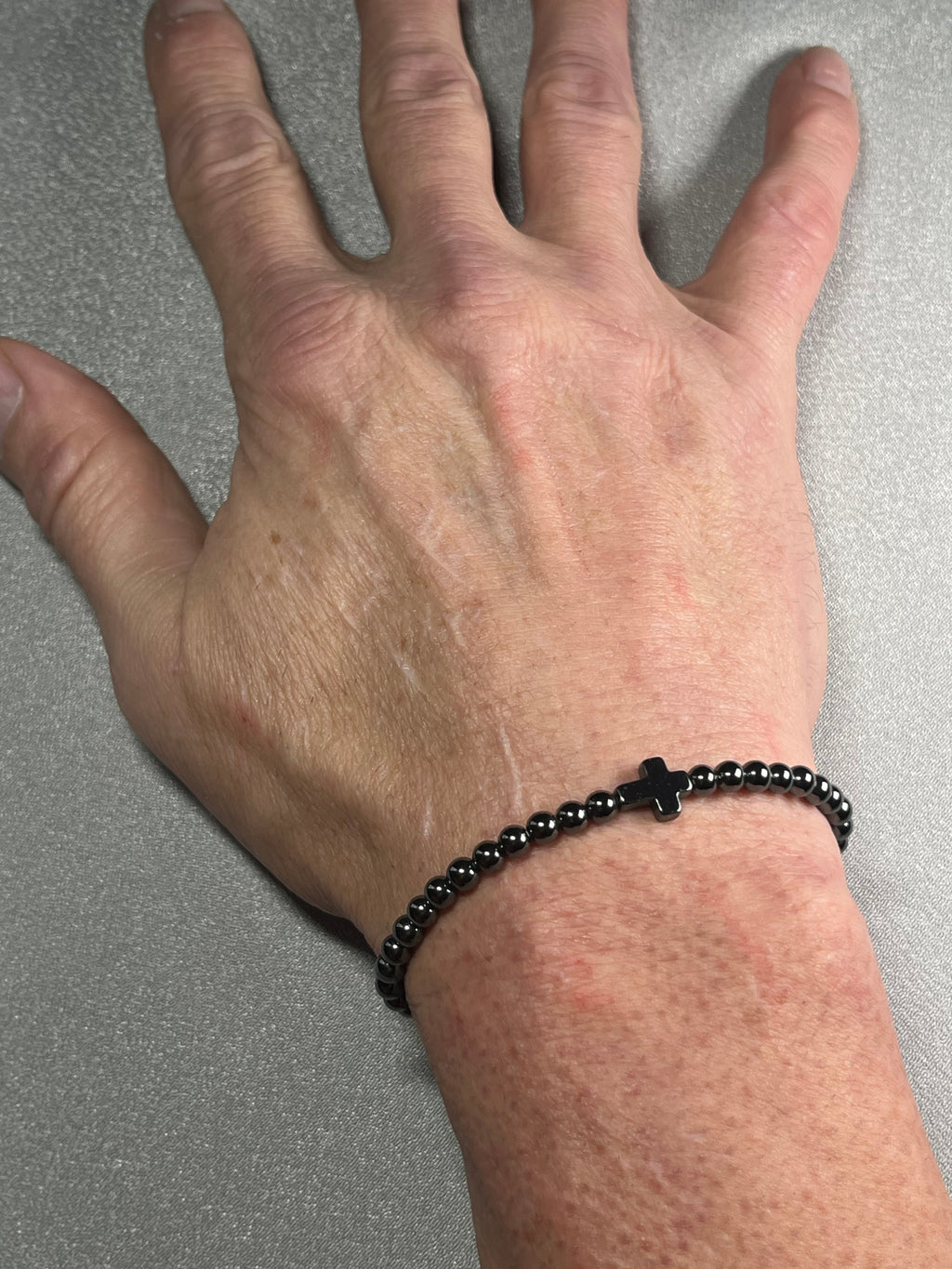 Hematite smooth round 4mm and 6mm bead stretch bracelets w/ Hematite Christian cross focal beads