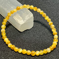 Golden Tiger’s Eye smooth round 4mm and 6mm bead stretch bracelet