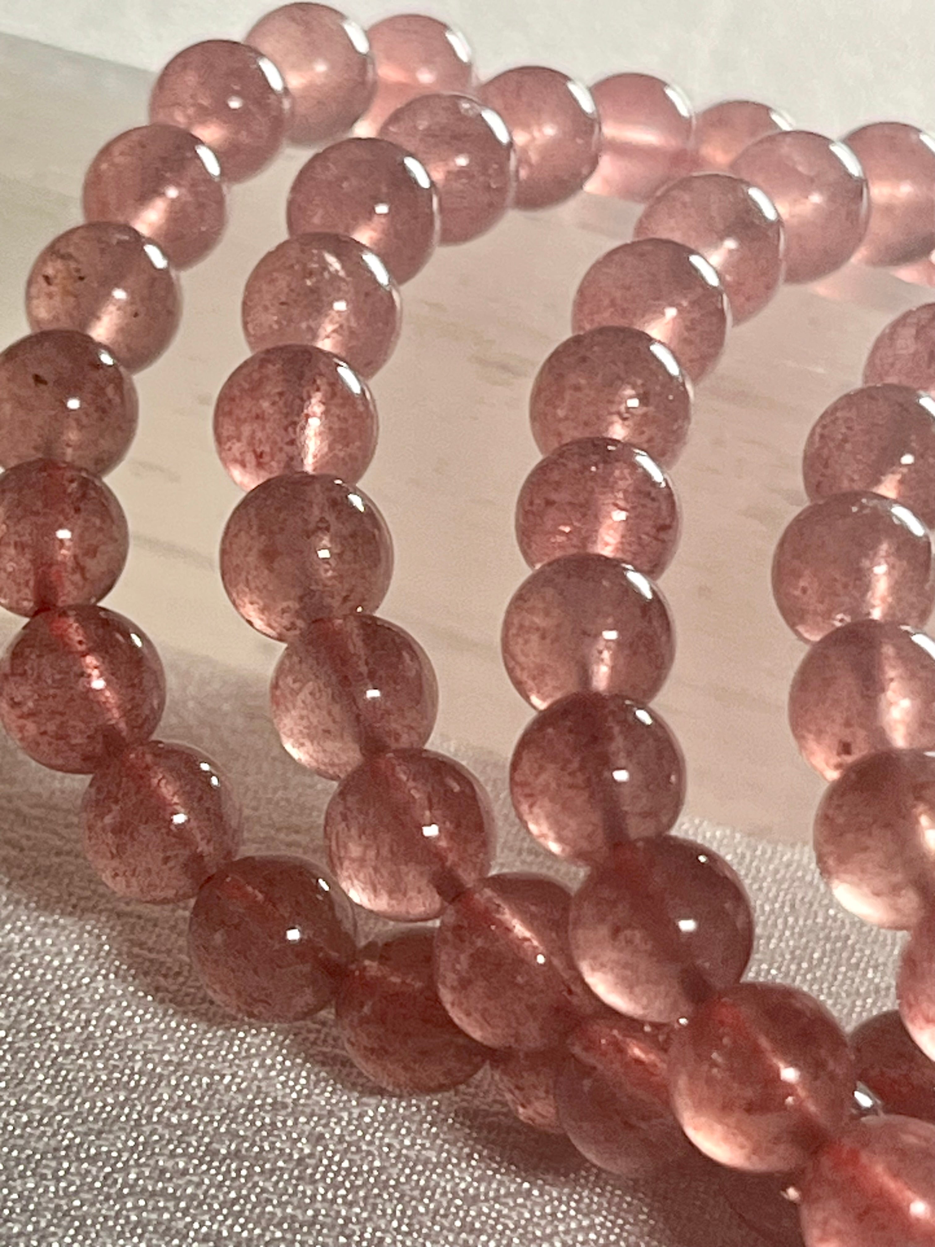 Strawberry Quartz smooth round 6mm bead stretch bracelet (AA grade)