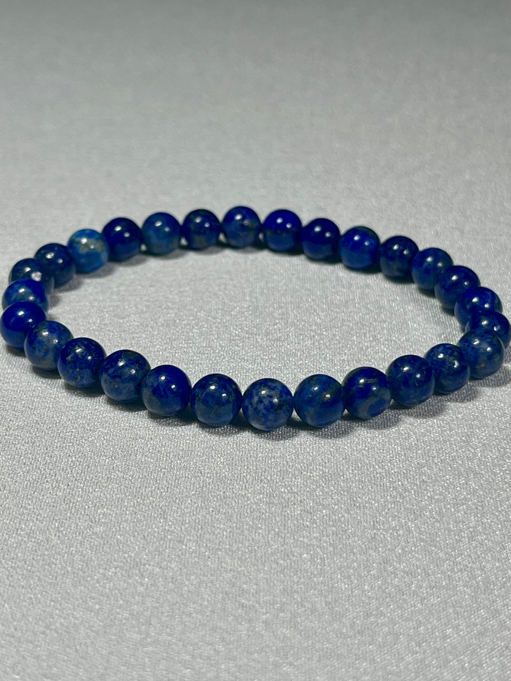 Lapis Lazuli smooth round 6mm bead stretch bracelet (A grade); alternative September birthstone