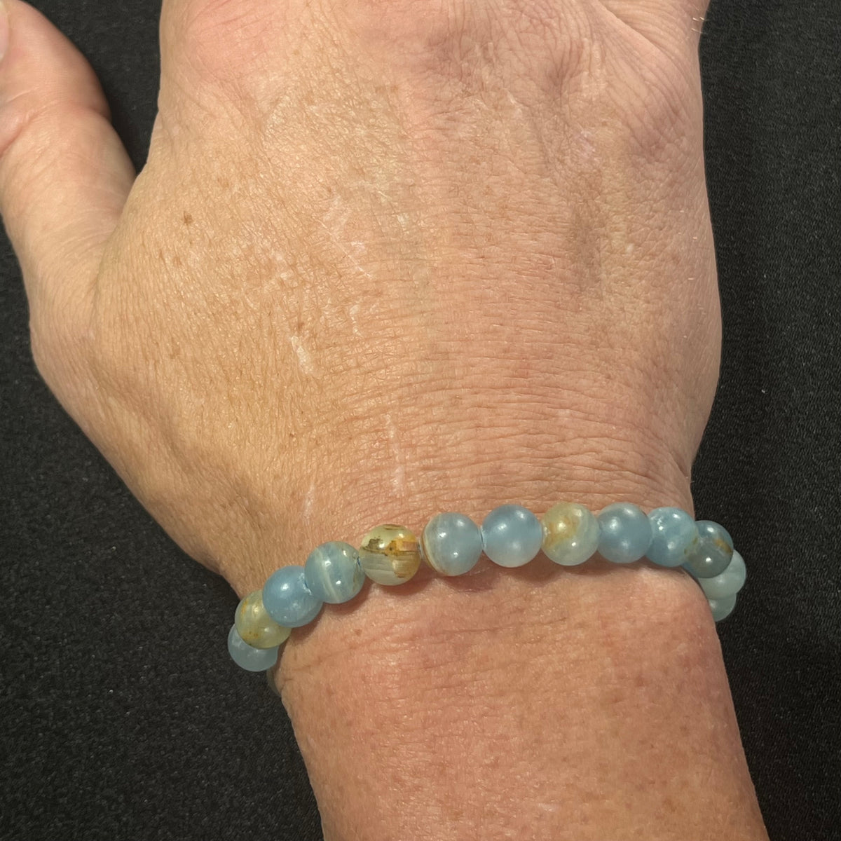 Argentina Blue Calcite smooth round 8mm bead stretch bracelet (AAA grade)