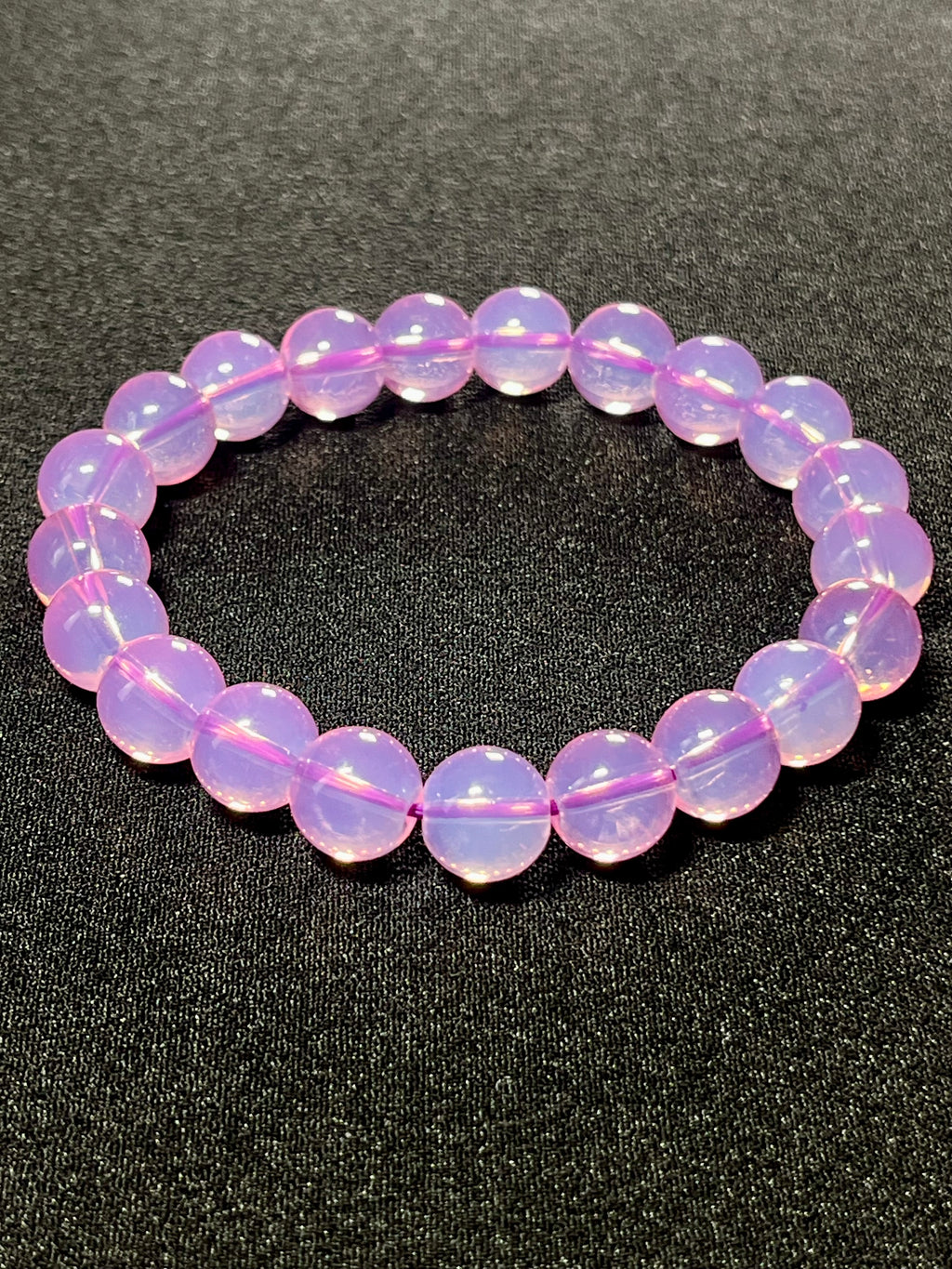 Plum Pink Opalite smooth round 10mm bead stretch bracelet (synthetic)