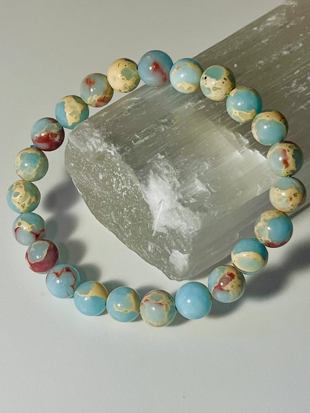 Icy Blue Aqua Terra Jasper smooth round 8mm bead stretch bracelet (dyed)
