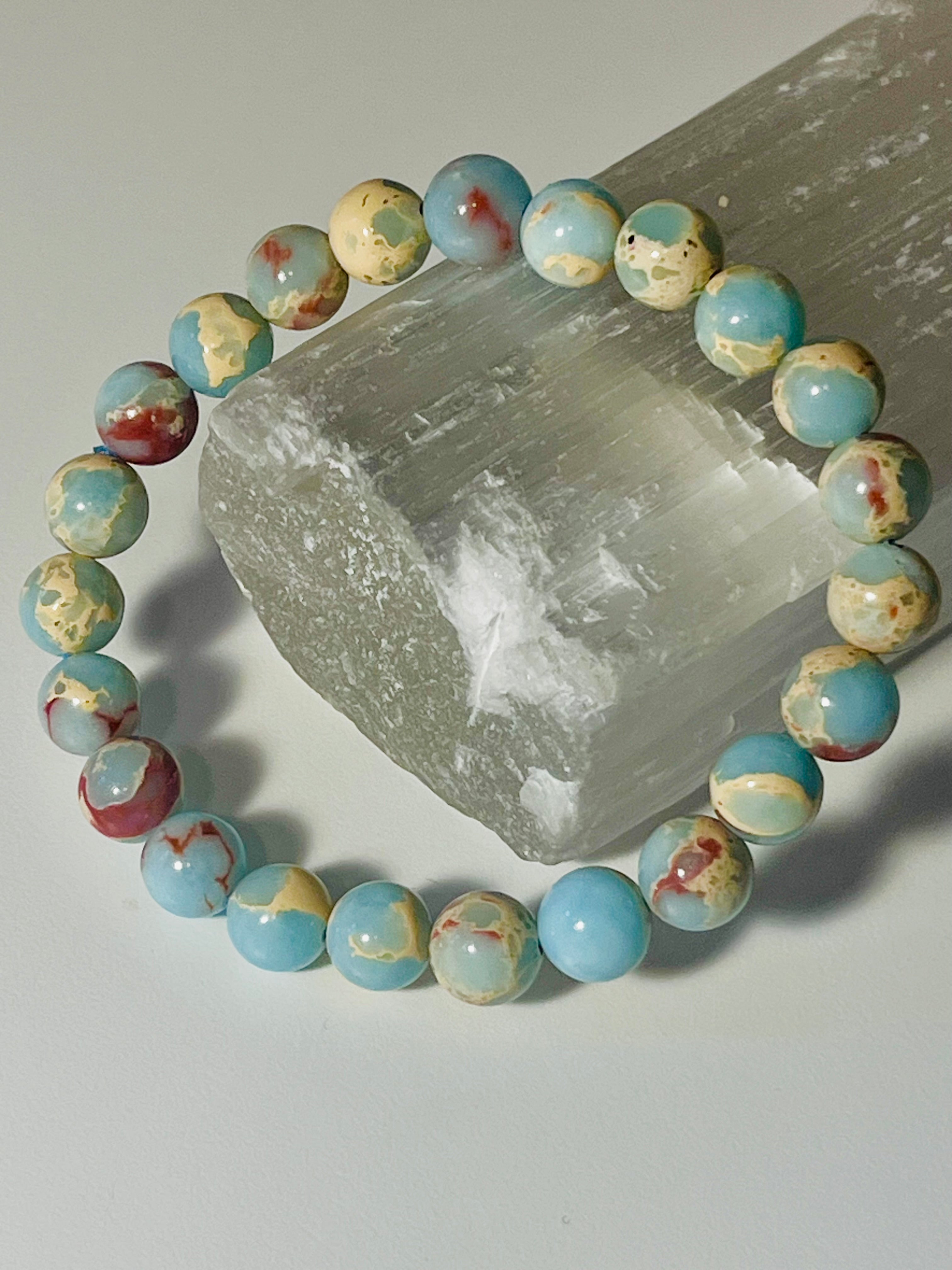 Icy Blue Aqua Terra Jasper smooth round 8mm bead stretch bracelet (dyed)