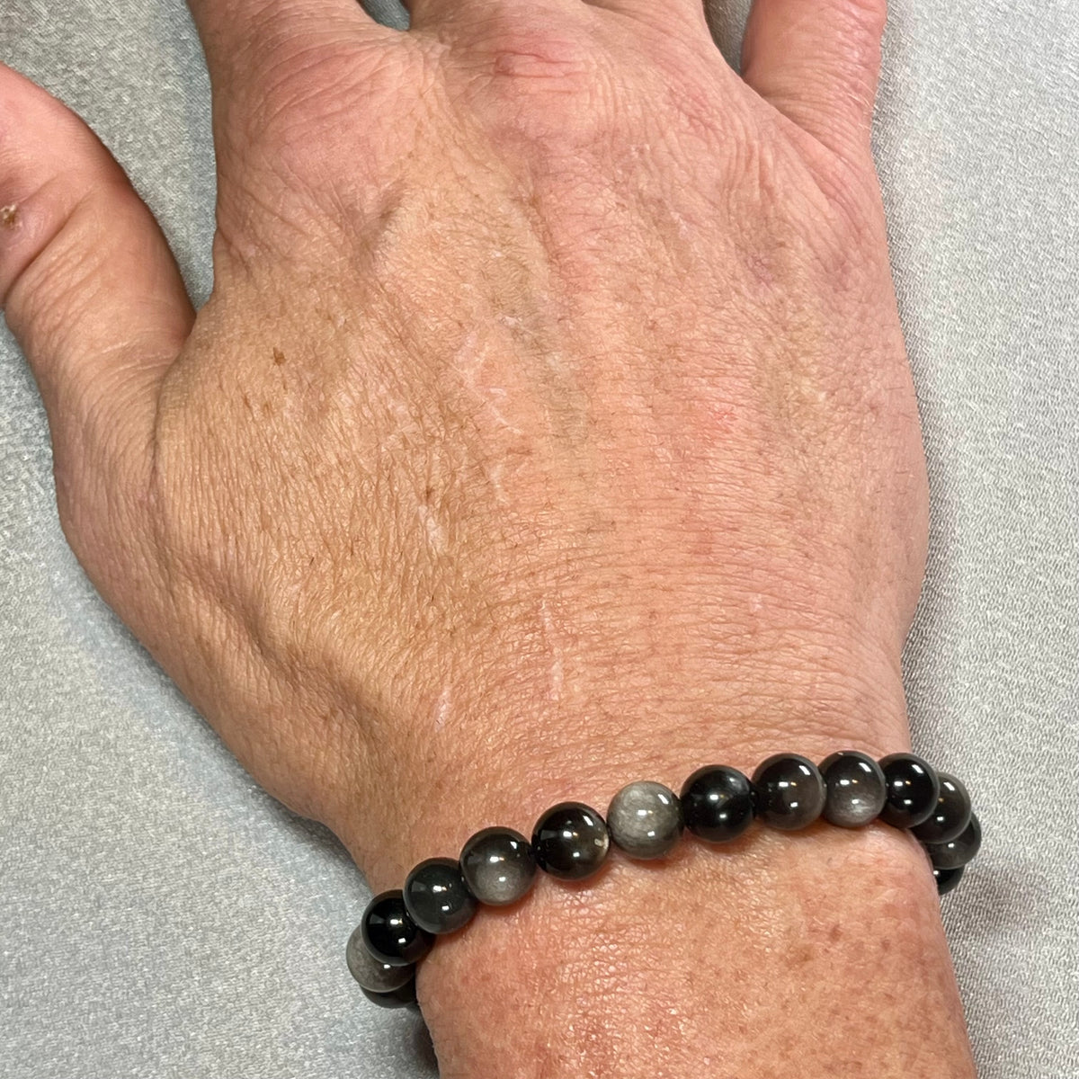 Silver Sheen Obsidian smooth round 8mm bead stretch bracelet