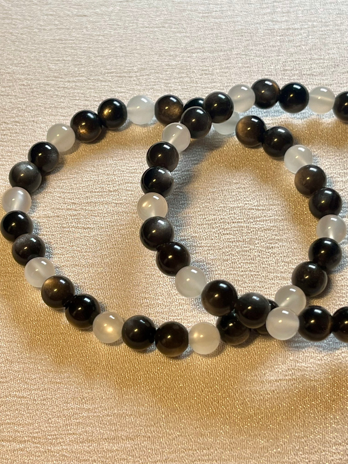 High-quality Silver Sheen Obsidian & White Moonstone smooth round 6mm bead stretch bracelet