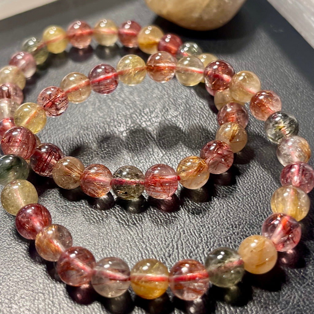 Strawberry, Golden, & Green Rutilated Quartz smooth round 7mm bead stretch bracelet