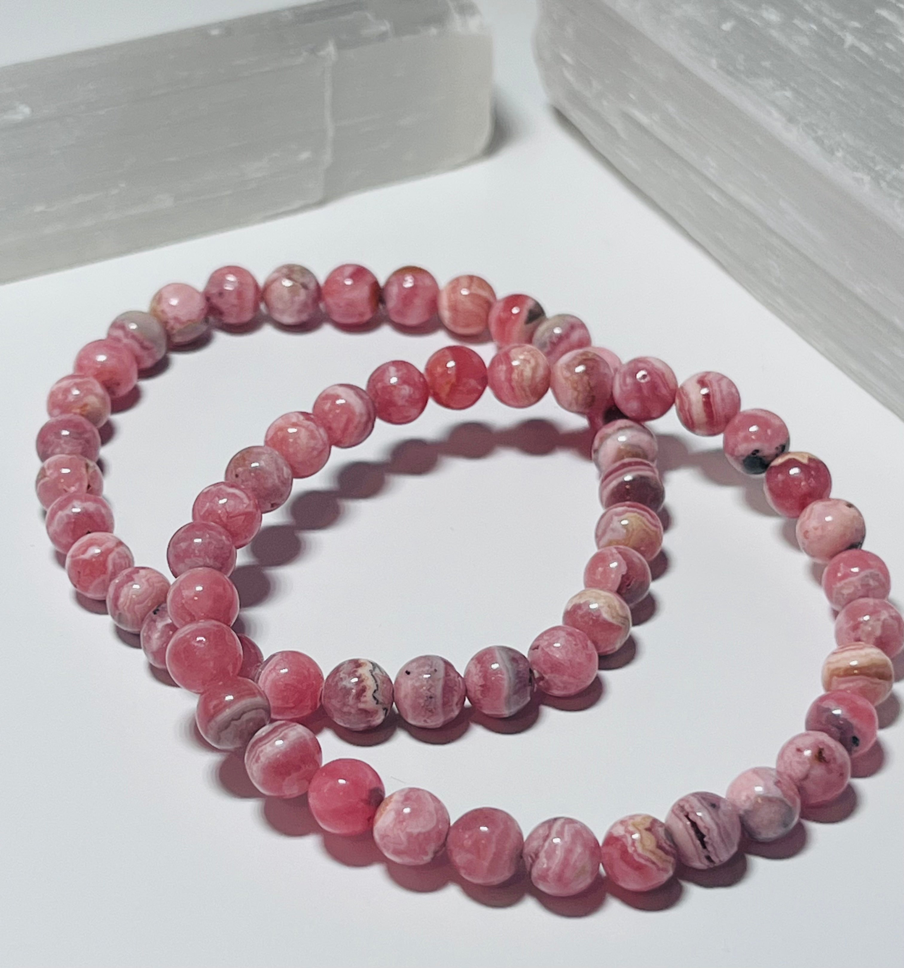 Argentina Rhodochrosite smooth round 6mm bead stretch bracelet