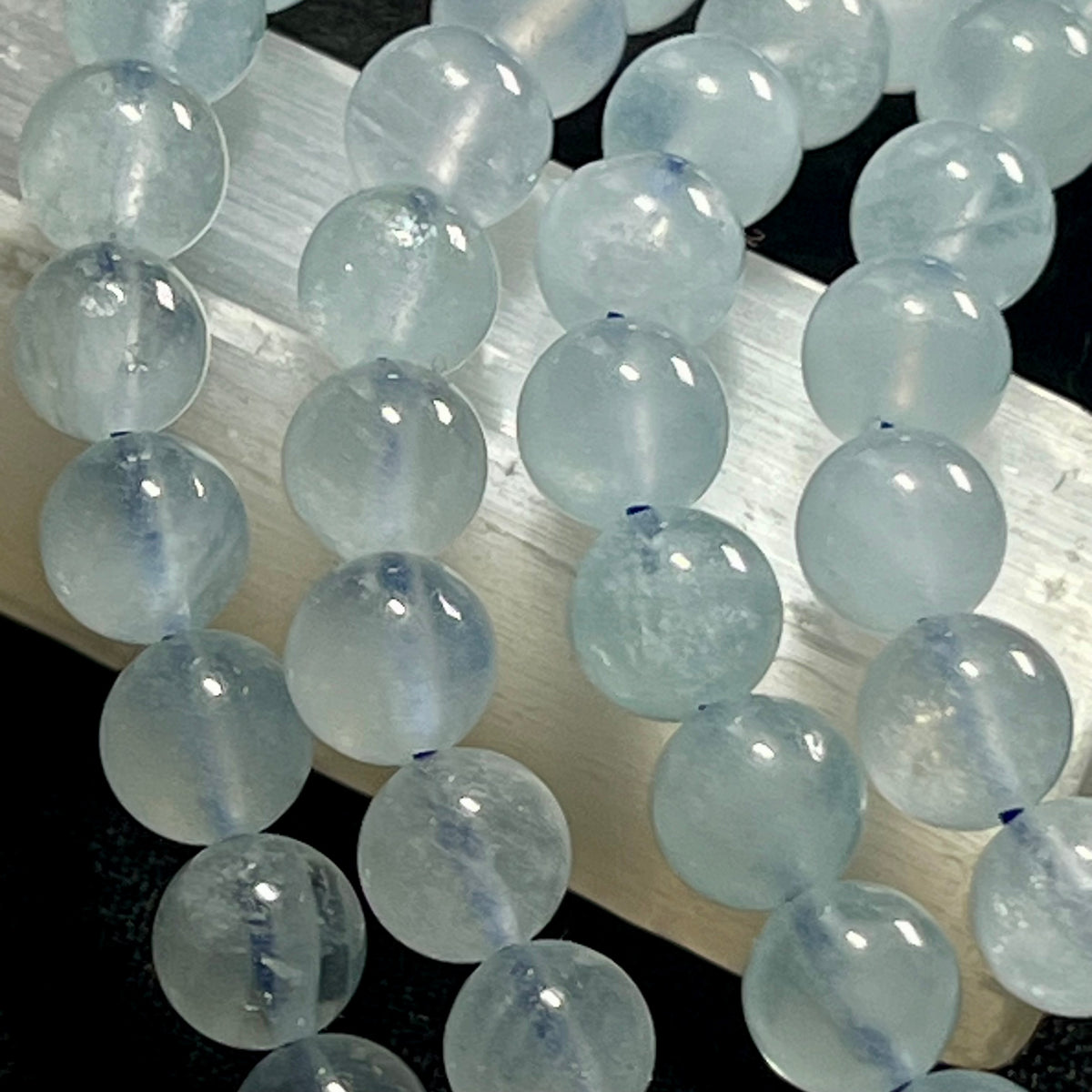 Aquamarine smooth round 6mm bead stretch bracelet; March birthstone