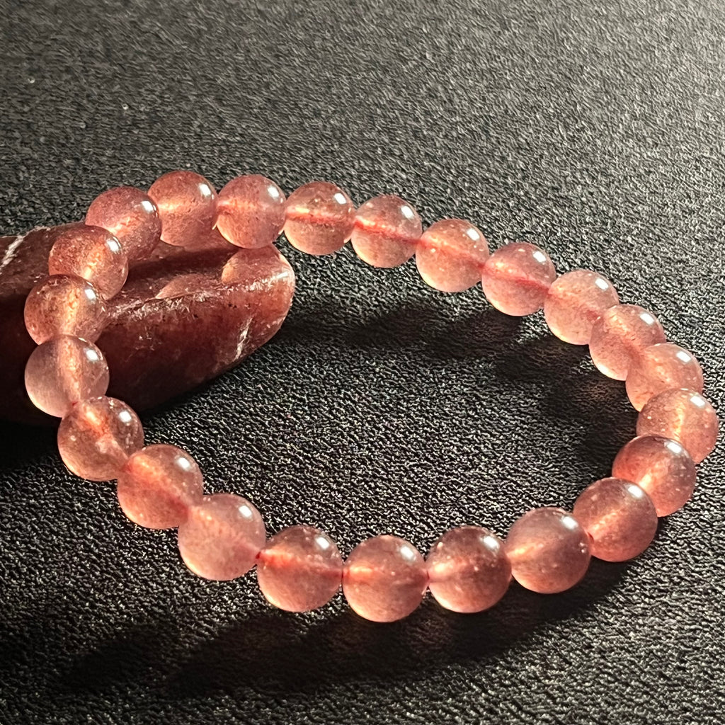 Strawberry Quartz w/ Sparkling Golden Sunstone inclusions smooth round 8mm bead stretch bracelet (AAA grade)