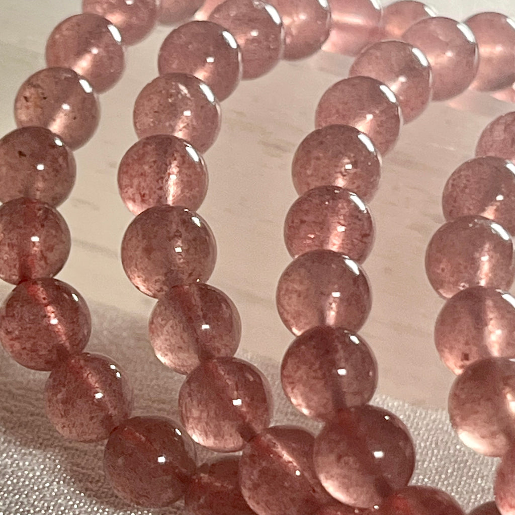 Strawberry Quartz smooth round 6mm bead stretch bracelet (AA grade)