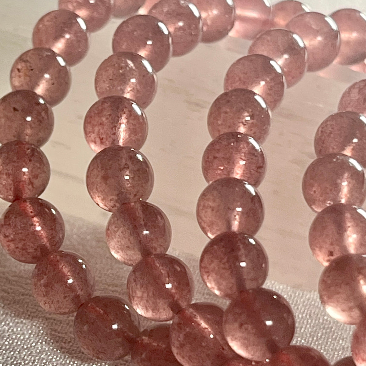 Strawberry Quartz smooth round 6mm bead stretch bracelet (AA grade)