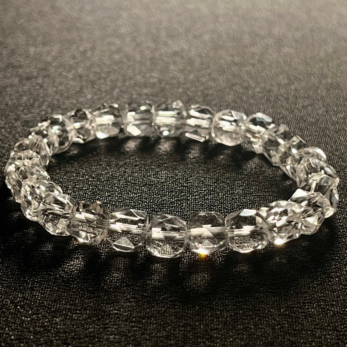 Clear Crystal Quartz microfaceted cube 7mm bead stretch bracelet; April birthstone