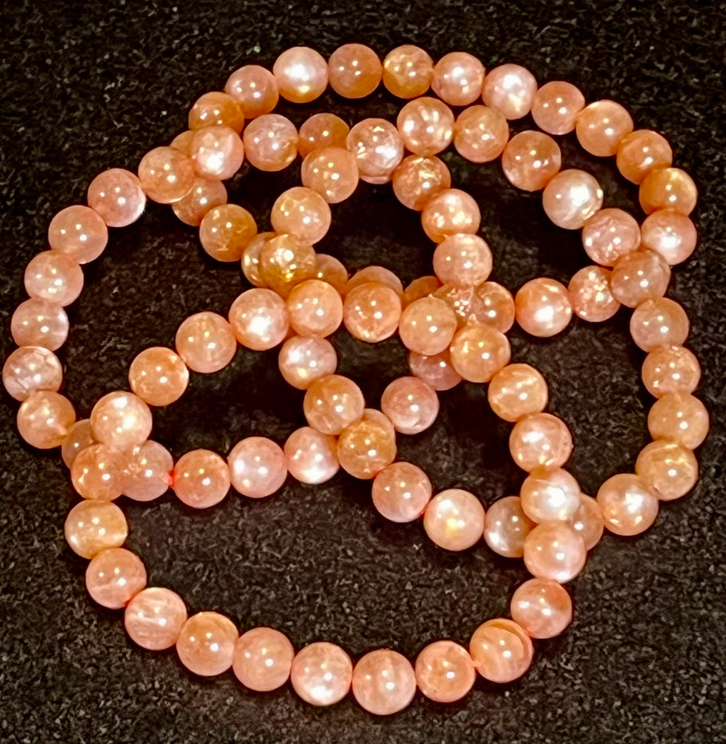Sunstone w/ Moonstone adularescence flash smooth round 8mm bead stretch bracelet (AAA grade)