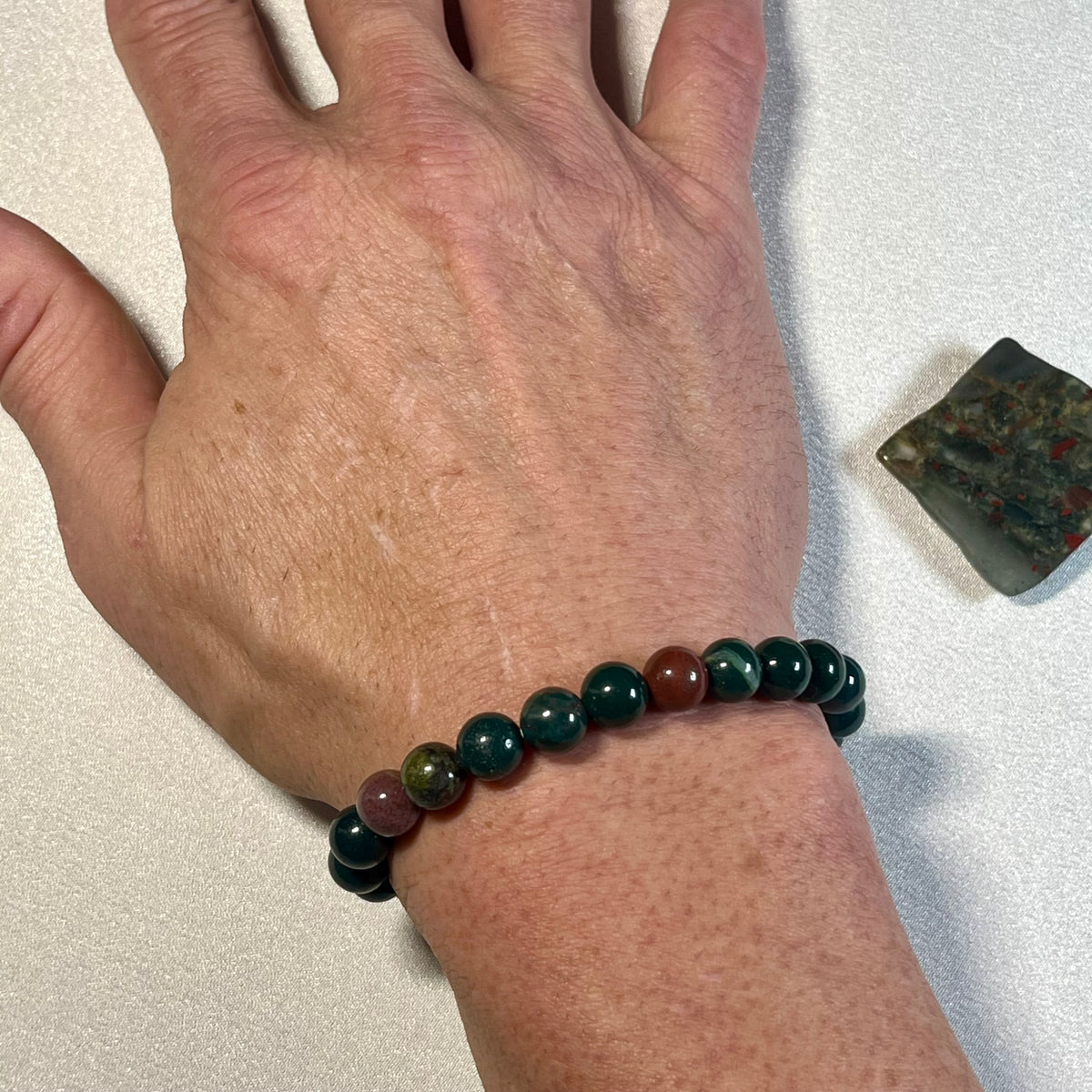 Bloodstone (Heliotrope) smooth round 6mm and 8mm bead stretch bracelet; alternative March birthstone