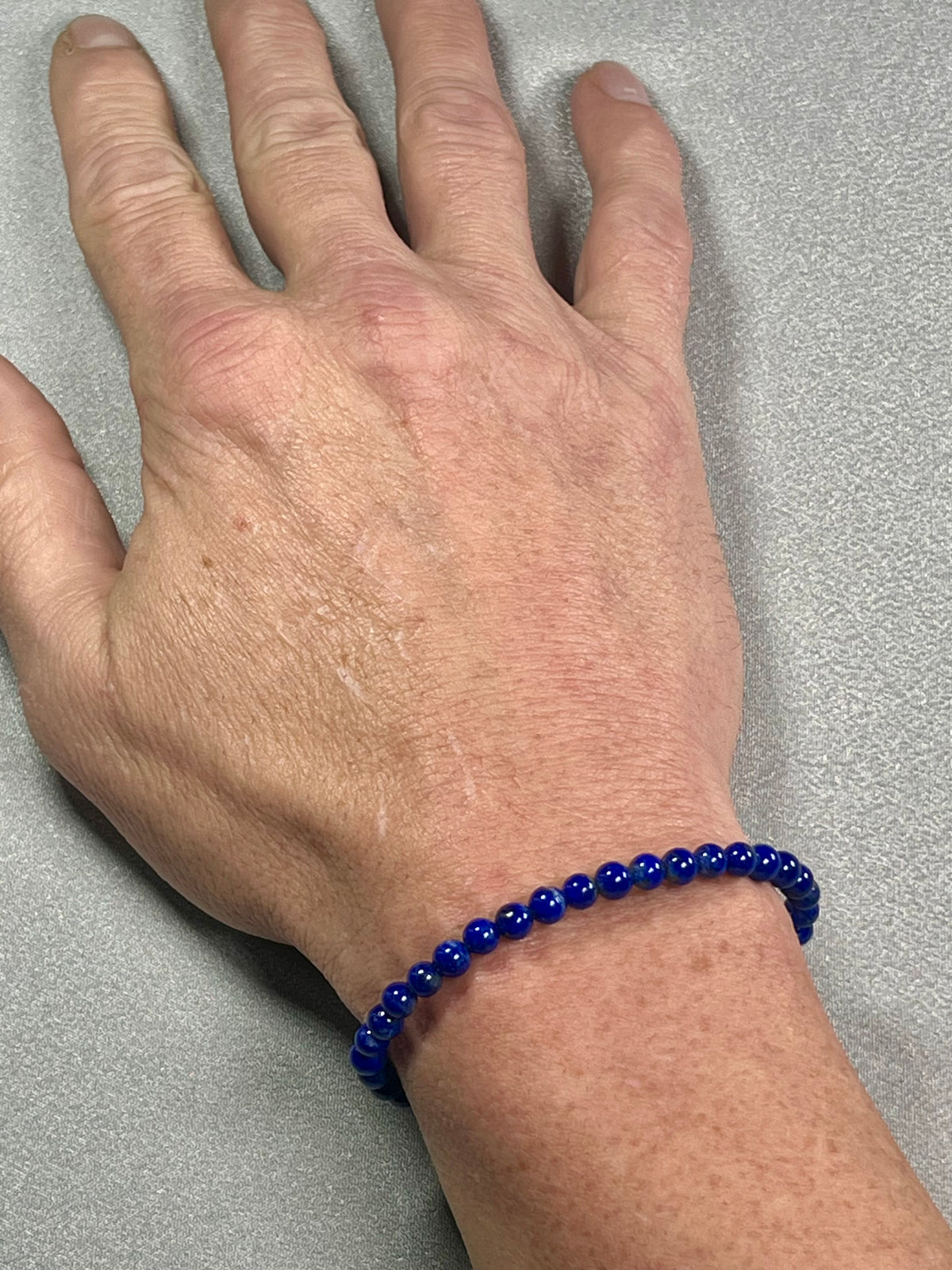 Lapis Lazuli smooth round 5mm bead stretch bracelet (AA grade); alternative September birthstone