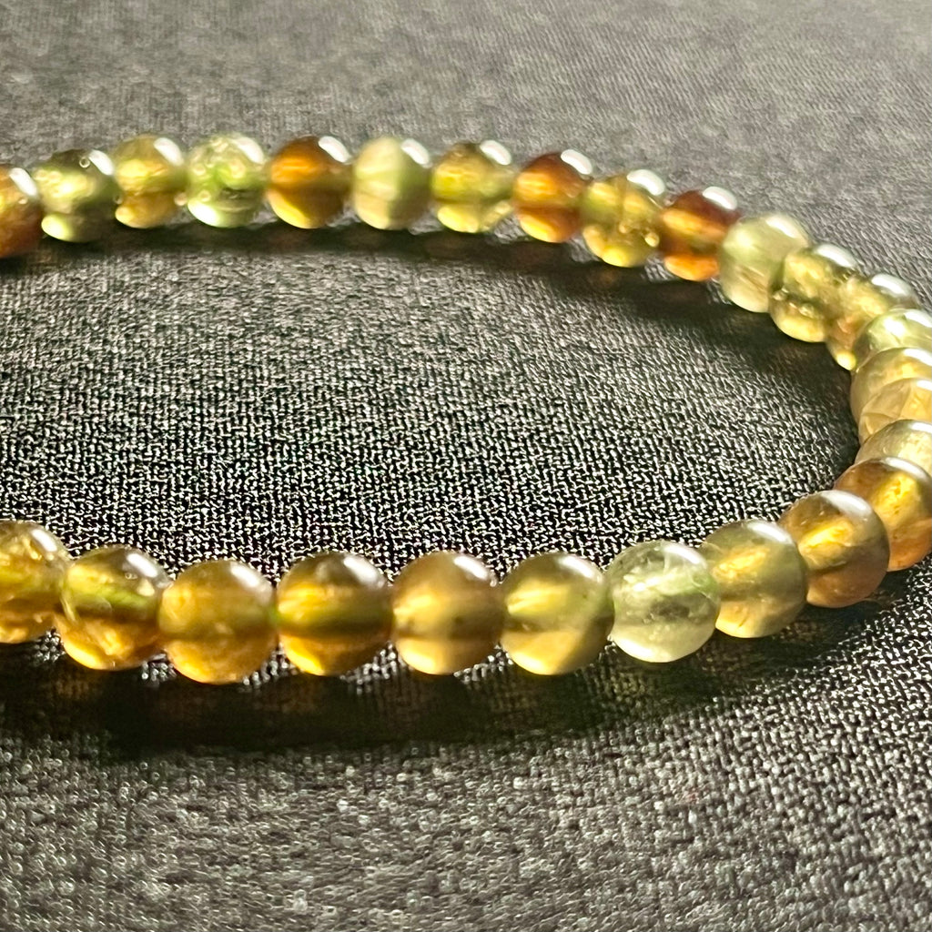 RARE Green Tsavorite Garnet smooth round 5mm bead stretch bracelet (AA grade)