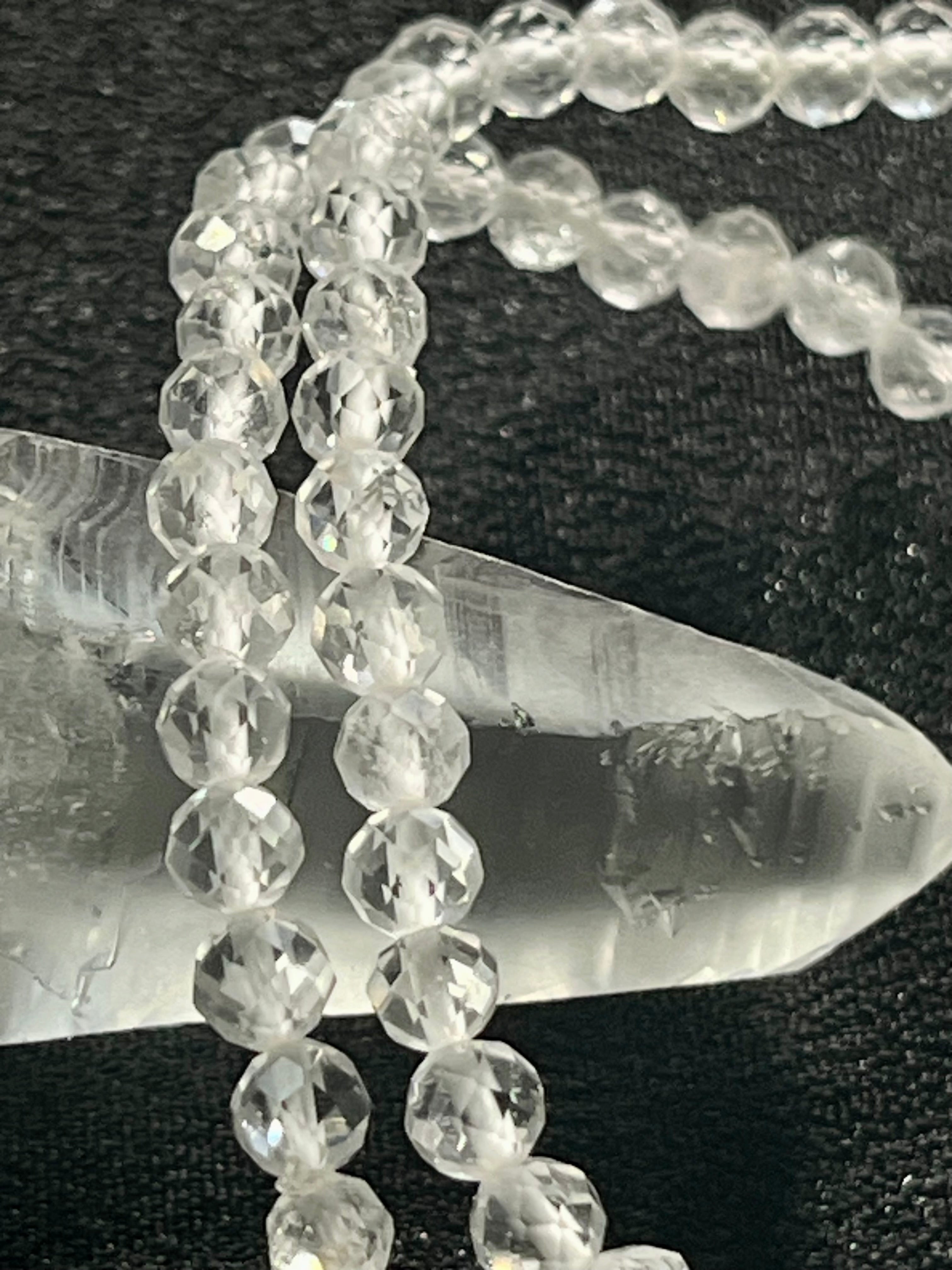 Clear Crystal Quartz faceted round 4mm bead stretch bracelet (premium)