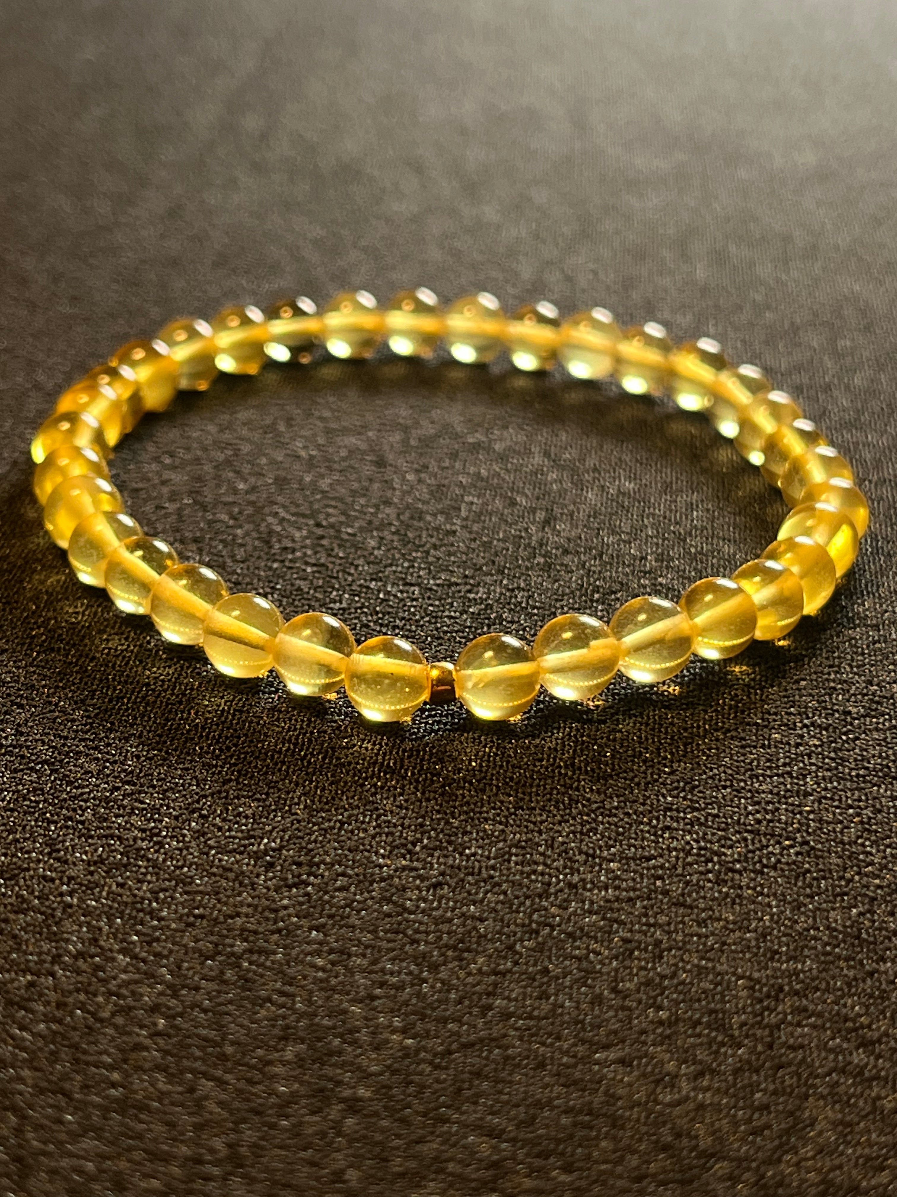 Amber (Light Yellow) w/ 24k gold spacer smooth round 5.5mm bead stretch bracelet