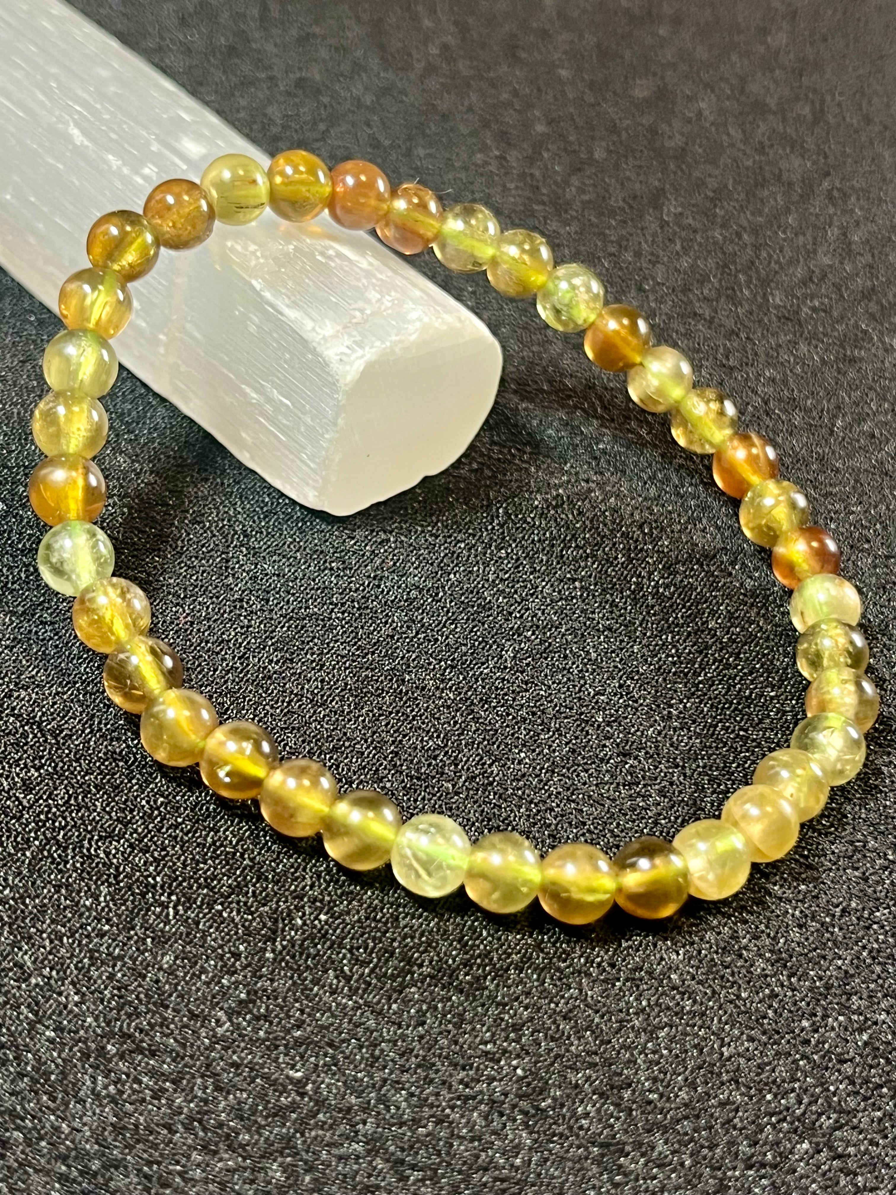 RARE Green Tsavorite Garnet smooth round 5mm bead stretch bracelet (AA grade)