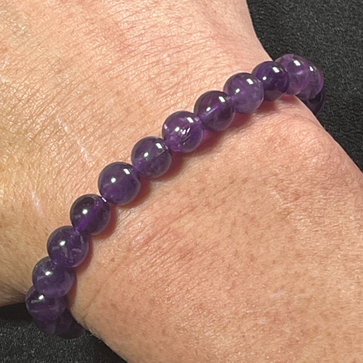 Amethyst smooth round 8mm bead stretch bracelet; February birthstone