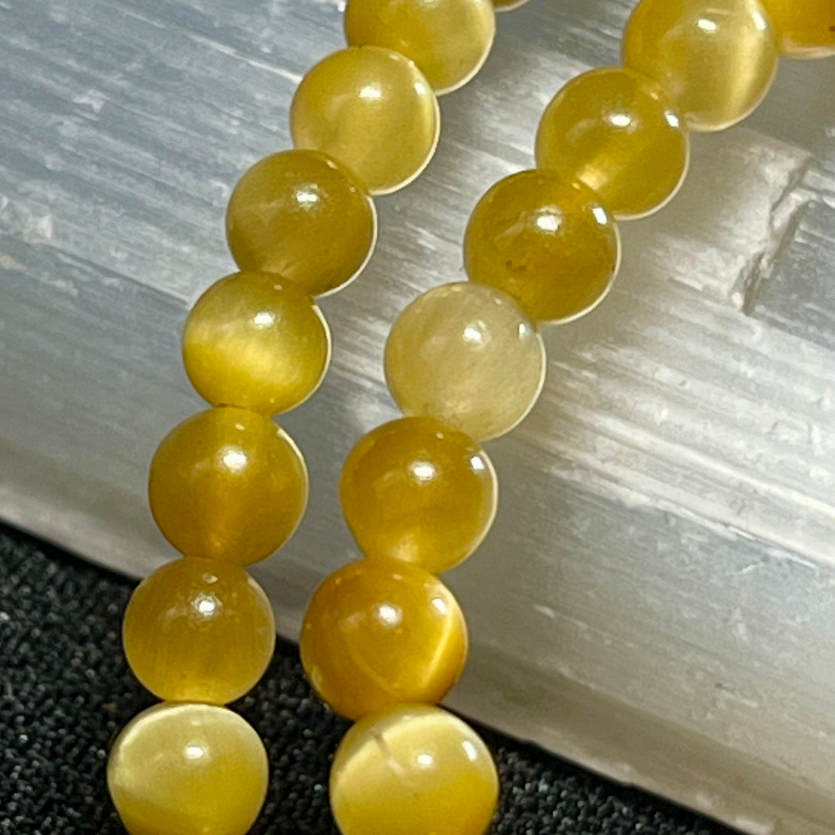 Golden Tiger’s Eye smooth round 4mm and 6mm bead stretch bracelet