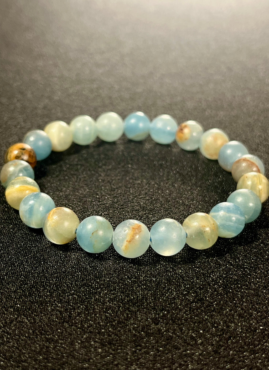 Argentina Blue Calcite smooth round 8mm bead stretch bracelet (AAA grade)