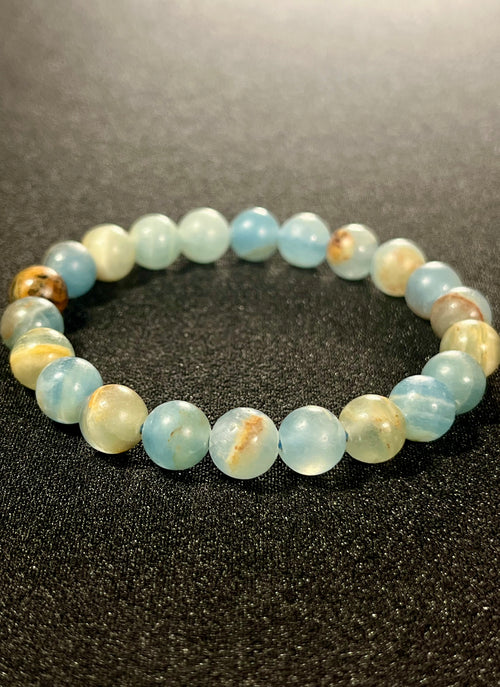 Argentina Blue Calcite smooth round 8mm bead stretch bracelet (AAA grade)