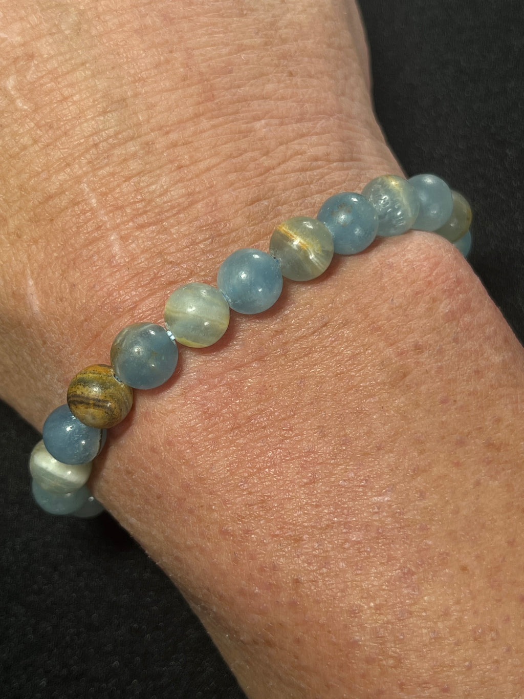 Argentina Blue Calcite smooth round 8mm bead stretch bracelet (AAA grade)