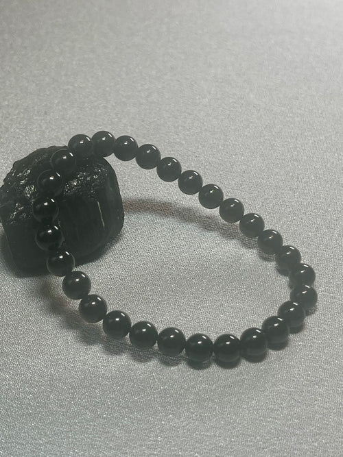 Black Tourmaline smooth round 6mm bead stretch bracelet (premium)