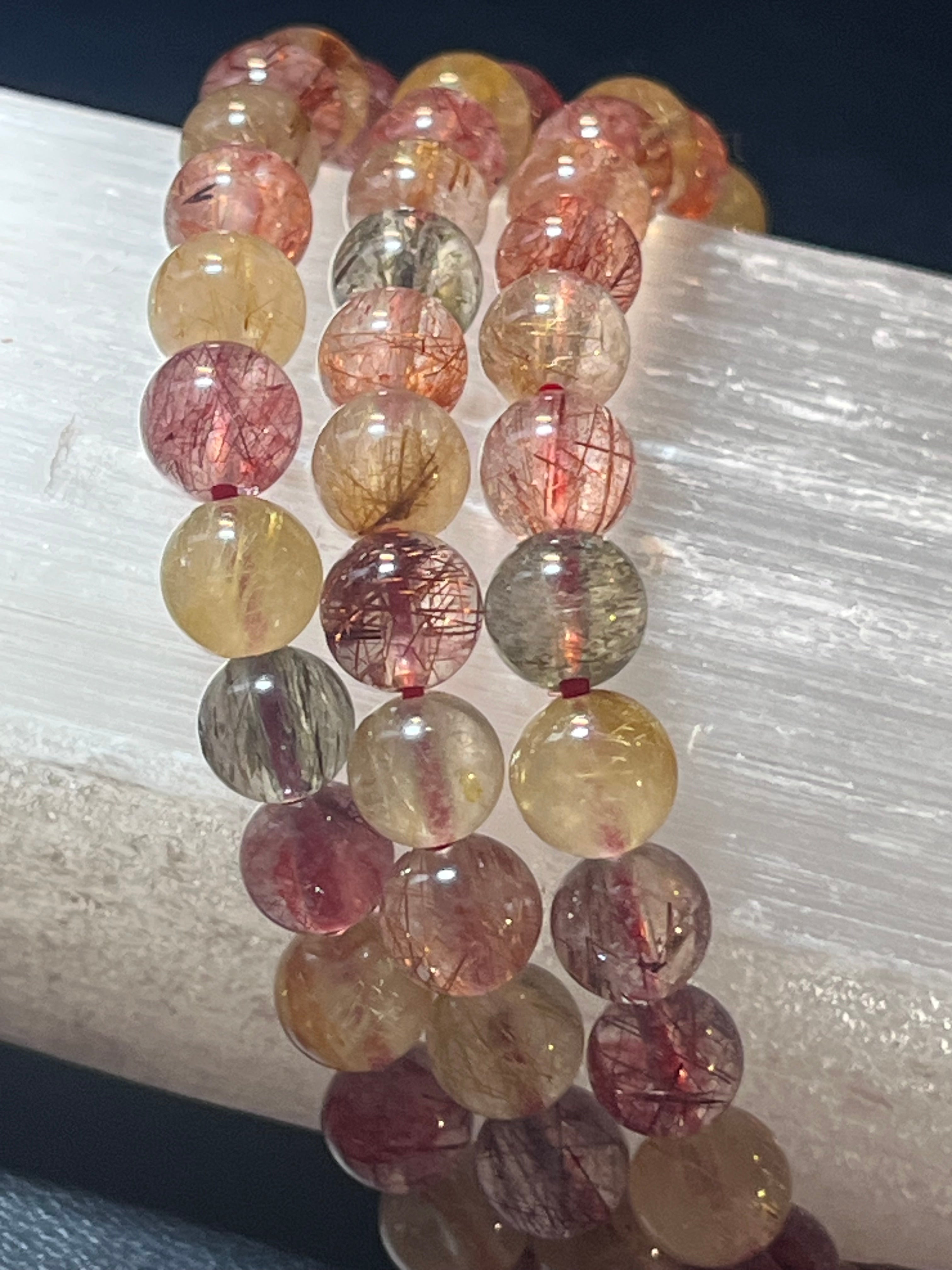 Strawberry, Golden, & Green Rutilated Quartz smooth round 7mm bead stretch bracelet