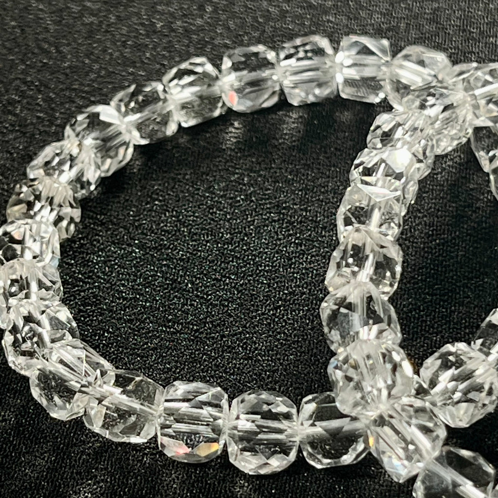 Clear Crystal Quartz microfaceted cube 7mm bead stretch bracelet; April birthstone