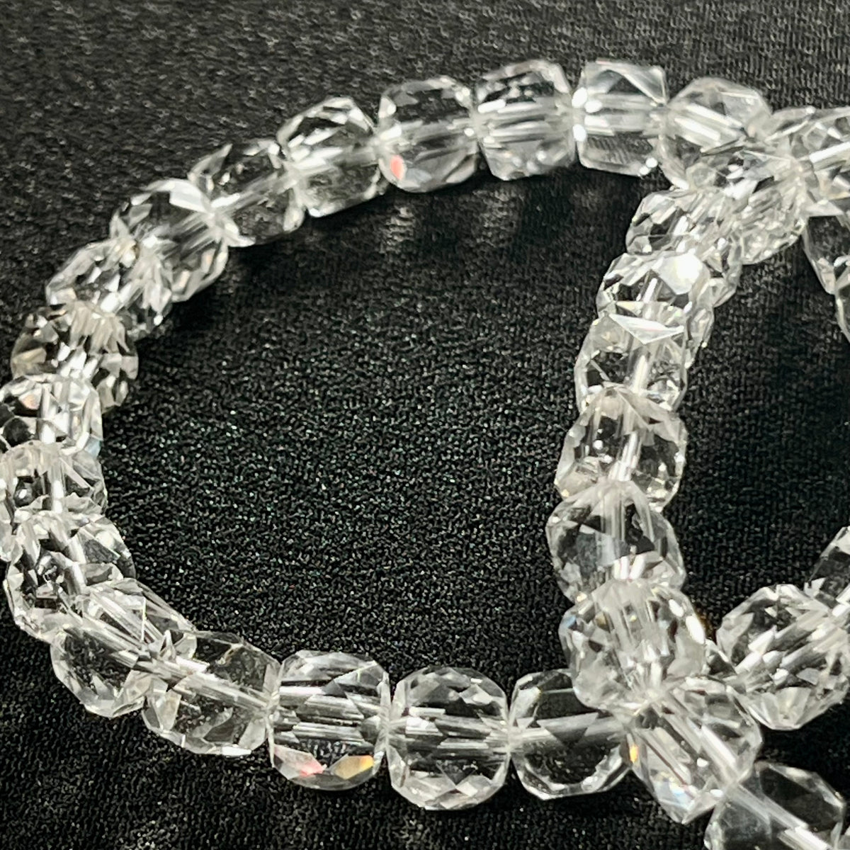 Clear Crystal Quartz microfaceted cube 7mm bead stretch bracelet; April birthstone