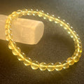 Amber (Light Yellow) w/ 24k gold spacer smooth round 5.5mm bead stretch bracelet