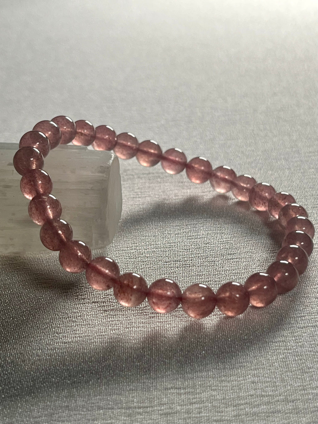 Strawberry Quartz smooth round 6mm bead stretch bracelet (AA grade)