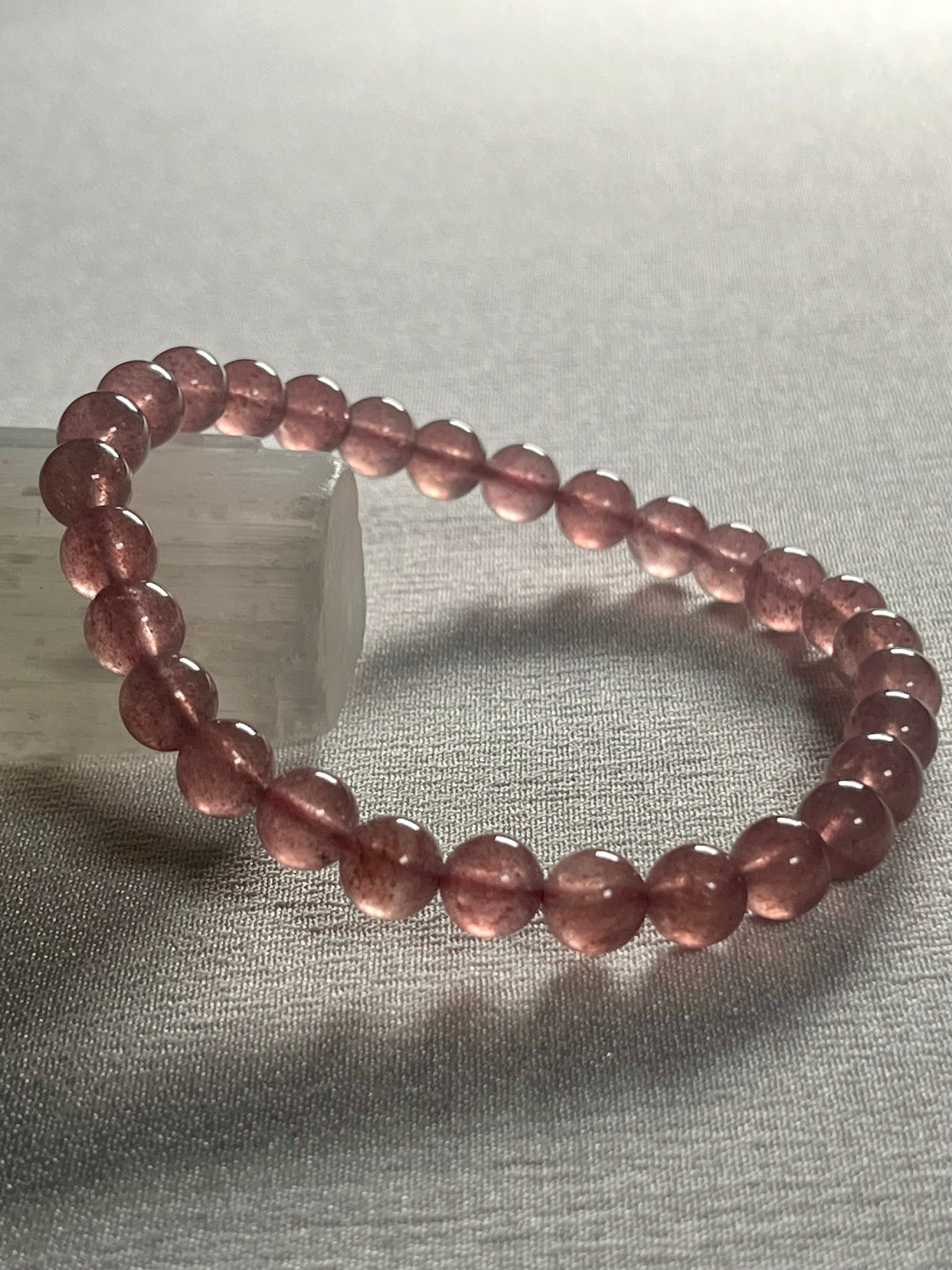 Strawberry Quartz smooth round 6mm bead stretch bracelet (AA grade)