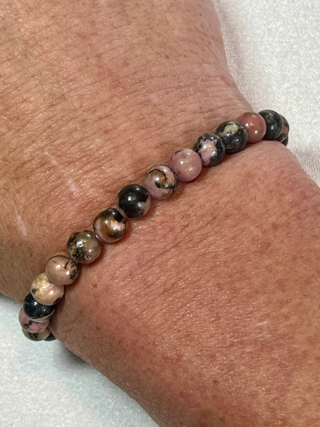 Rhodonite with black matrix smooth round 6mm bead stretch bracelet