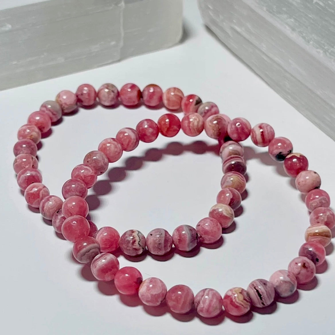 Argentina Rhodochrosite smooth round 6mm bead stretch bracelet