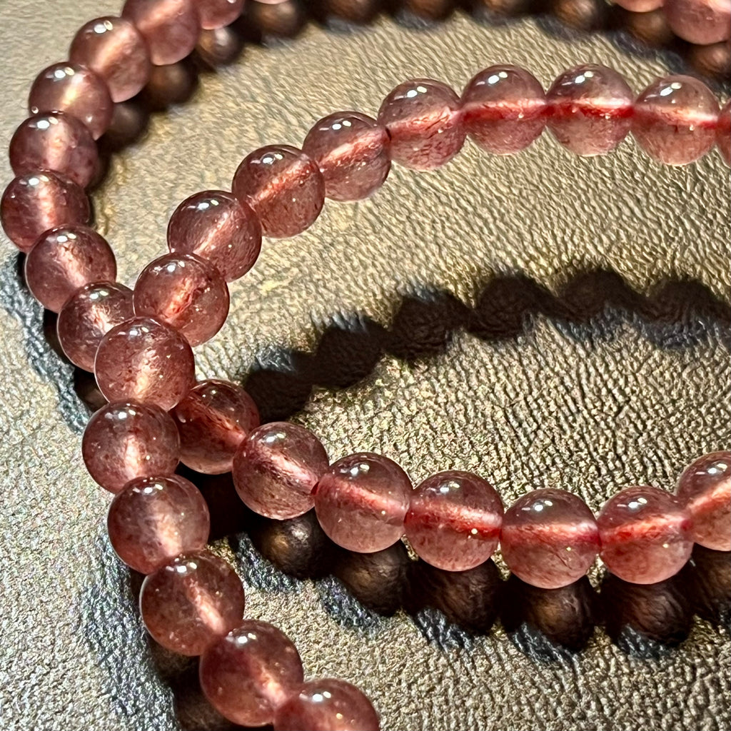 Strawberry Quartz smooth round 6mm bead stretch bracelet (AAA grade)