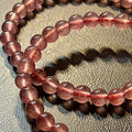 Strawberry Quartz smooth round 6mm bead stretch bracelet (AAA grade)